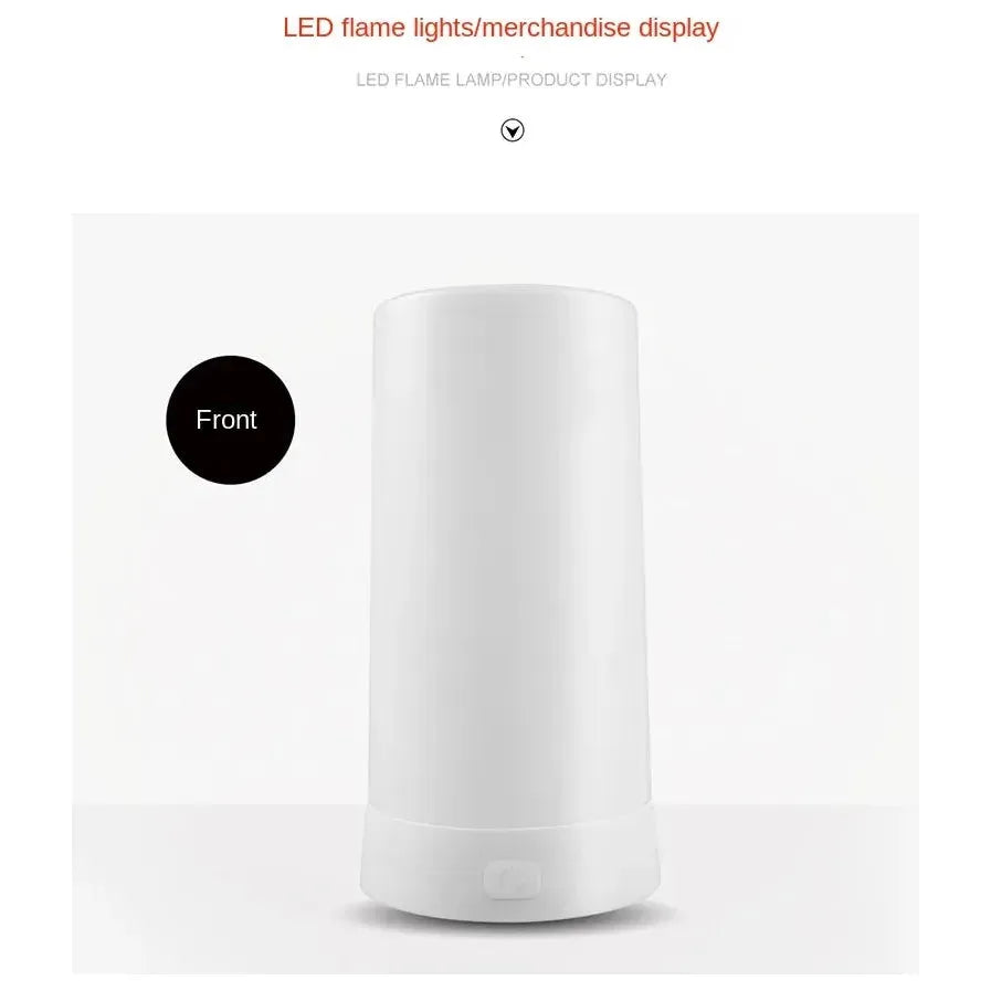 A white cylindrical Simulated Flame LED Night Light is displayed against a plain backdrop, highlighting its realistic flame effect. At the top, the text reads LED flame lights/merchandise display. The lamp is shown elegantly from the front.