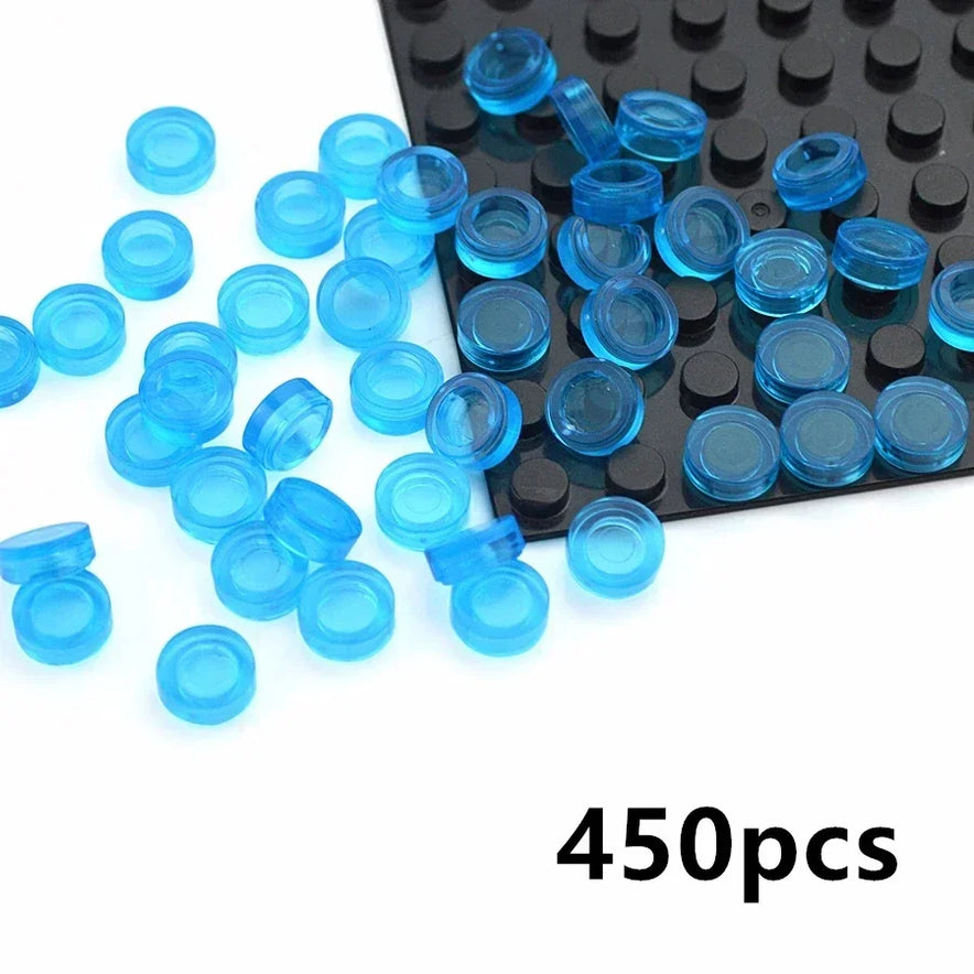 450pcs of MOC Transparent Bulk Brick Set in trans light blue (1x1, 1x2, 1x4, 2x4) parts are scattered on a black LEGO baseplate—ideal for any building block collection. Compatible with LEGO; “450pcs” shown in bold black font at the bottom right corner.