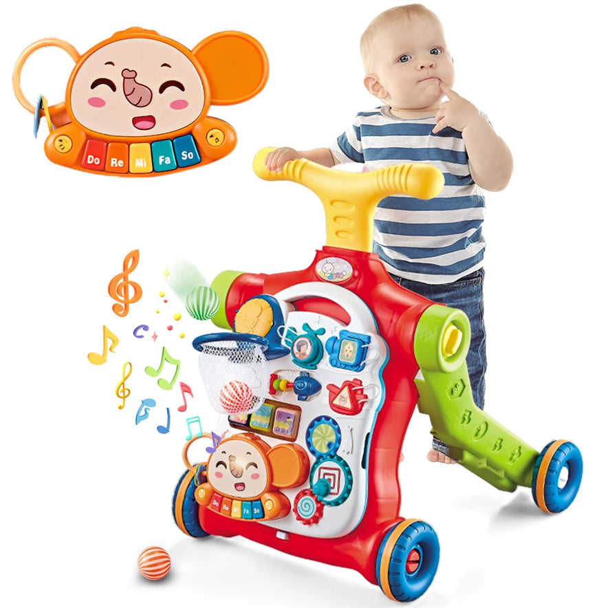 A toddler stands beside the green VATOS Baby Walker 5 in 1 Sit-to-Stand Learning Scooter featuring wheels, buttons, a basketball hoop, musical features, and a detachable monkey-shaped music panel with floating musical notes.