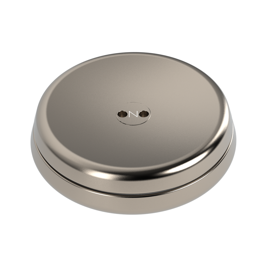 The ONO Slider Titanium is a round, metallic, titanium-colored object with a smooth, slightly domed surface and two small center holes—ideal as a minimalist fidget toy or as an accessory for your ONO Slider.