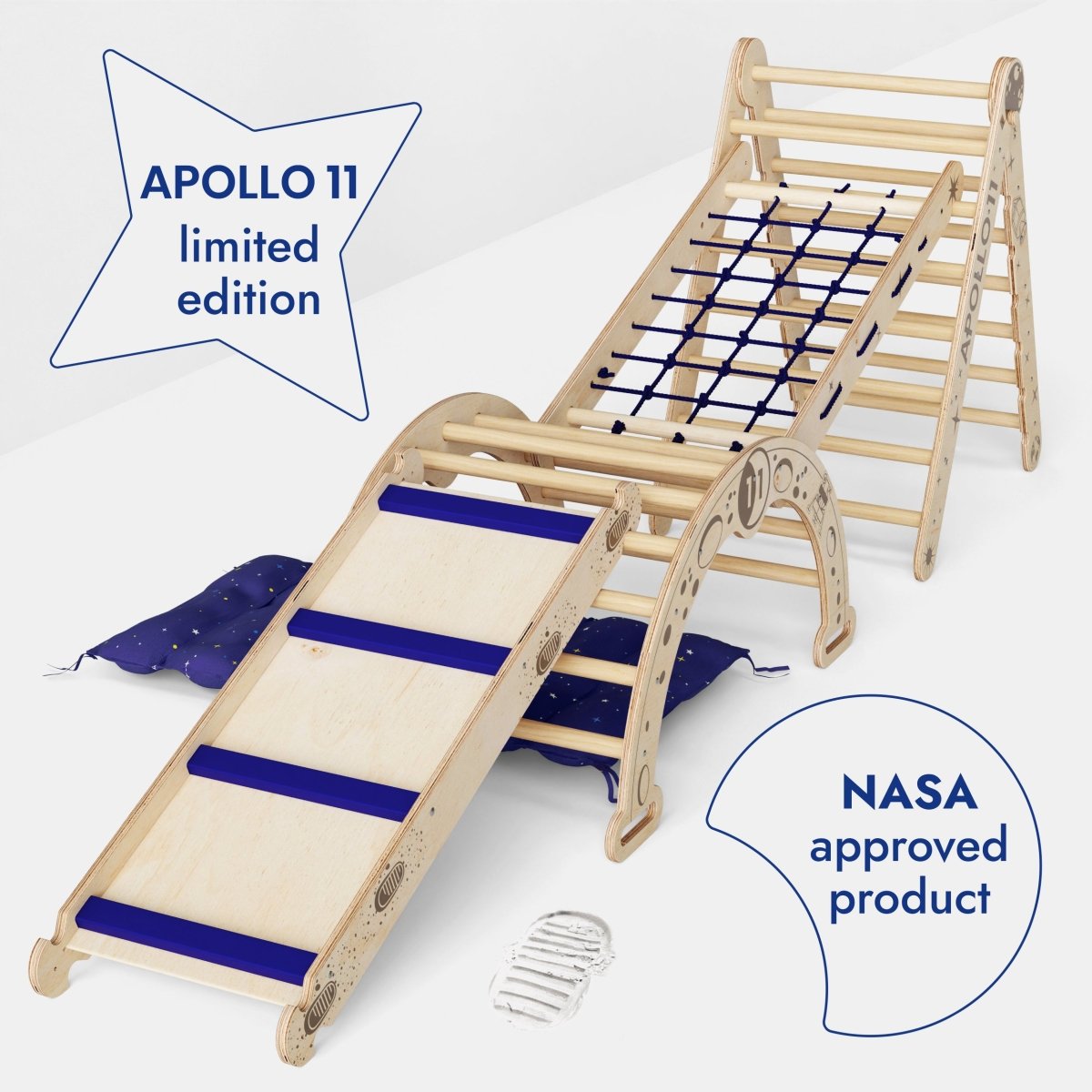 Apollo 5in1 Climbing Set features a Pikler Triangle, net, arch, slide board, and cushion for little astronauts. Styled with blue accents, starry cloth, and an astronaut figurine, this APOLLO 11 limited edition indoor playground is NASA approved.