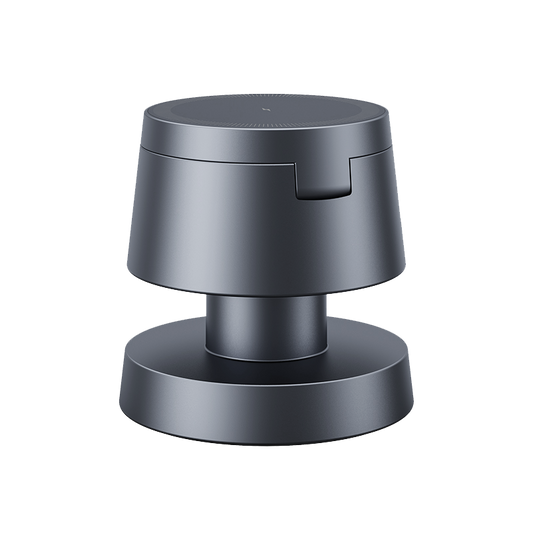 The 4-in-1 Wireless Charging Station, featuring a sleek dark gray two-tier design with a notch on the upper level and a wide base, offers convenient charging for Apple devices, shown against a plain white background.