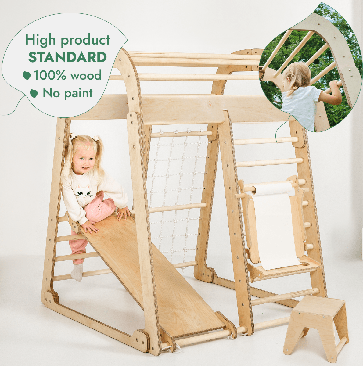 A young girl plays on the Indoor Playground for Children - 7in1 Playground + Swings Set + Slide Board + Art Set, featuring a slide, rope net, ladder, and drawing paper roll. A bubble reads: High product STANDARD 100% wood No paint. Inset shows a child climbing.