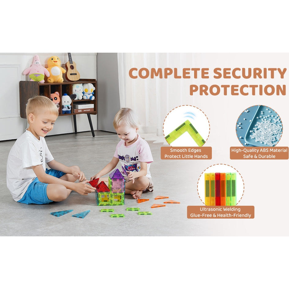 Two kids play with the VEVOR 32PCS Colorful Magnetic Building Tiles on a carpeted floor. A shelf of stuffed animals is in the background, while text emphasizes their smooth edges, durable plastic, and ultrasonic welding for safety, making them an ideal STEM educational tool.