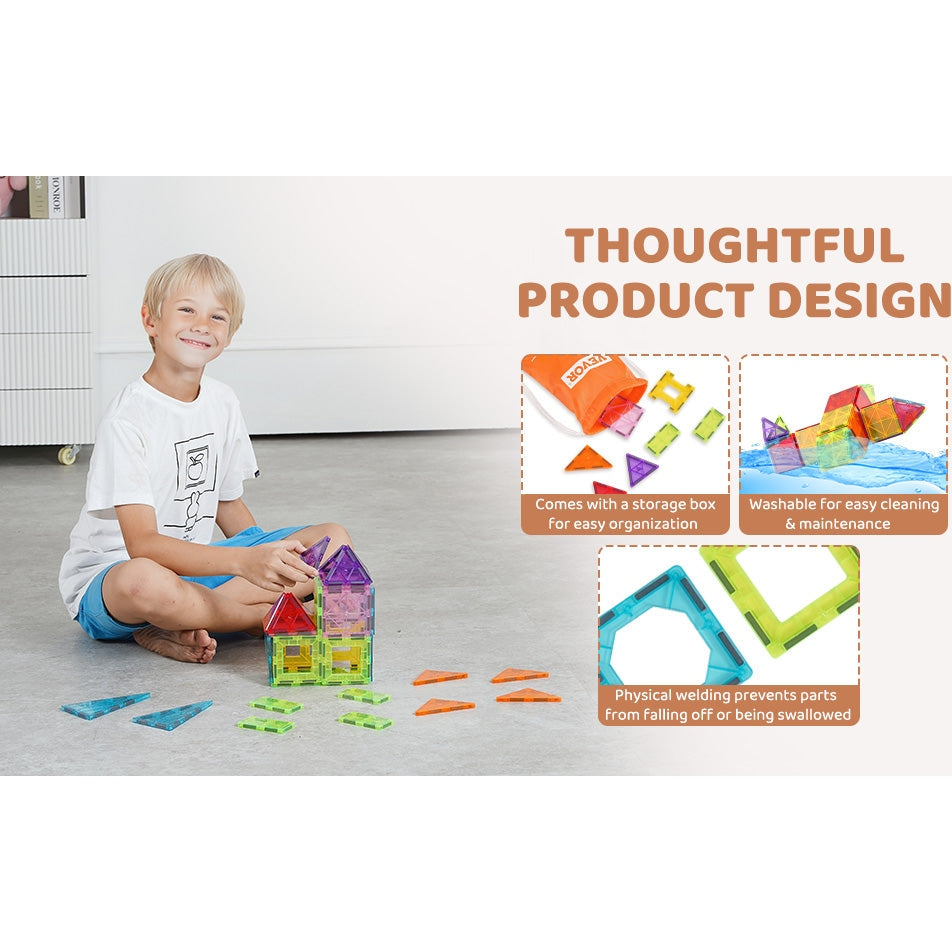 A child smiles while sitting on the floor, playing with the VEVOR 32PCS Colorful Magnetic Building Tiles Set, shaped like a house. This STEM educational toy features durable plastic for longevity, easy storage, washable materials, and physical welding for safety.
