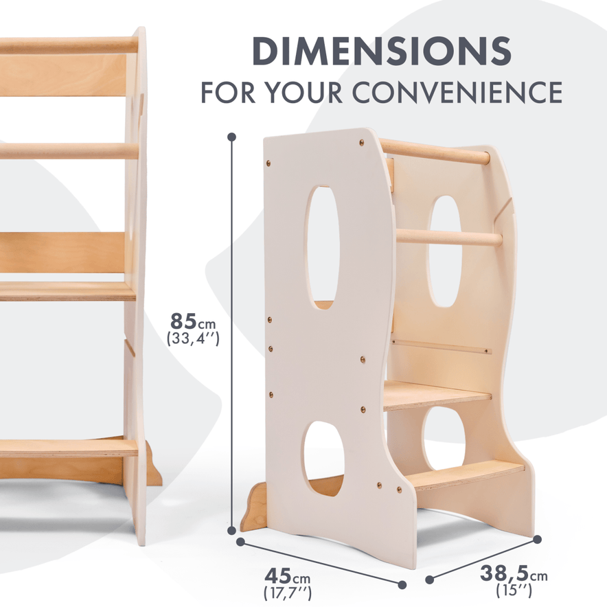 The Stable Montessori Learning Tower: Wooden Growing Chair - Ivory is made from natural wood, has side handles, an adjustable platform, two steps, and measures 85 cm tall, 45 cm wide, and 38.5 cm deep.
