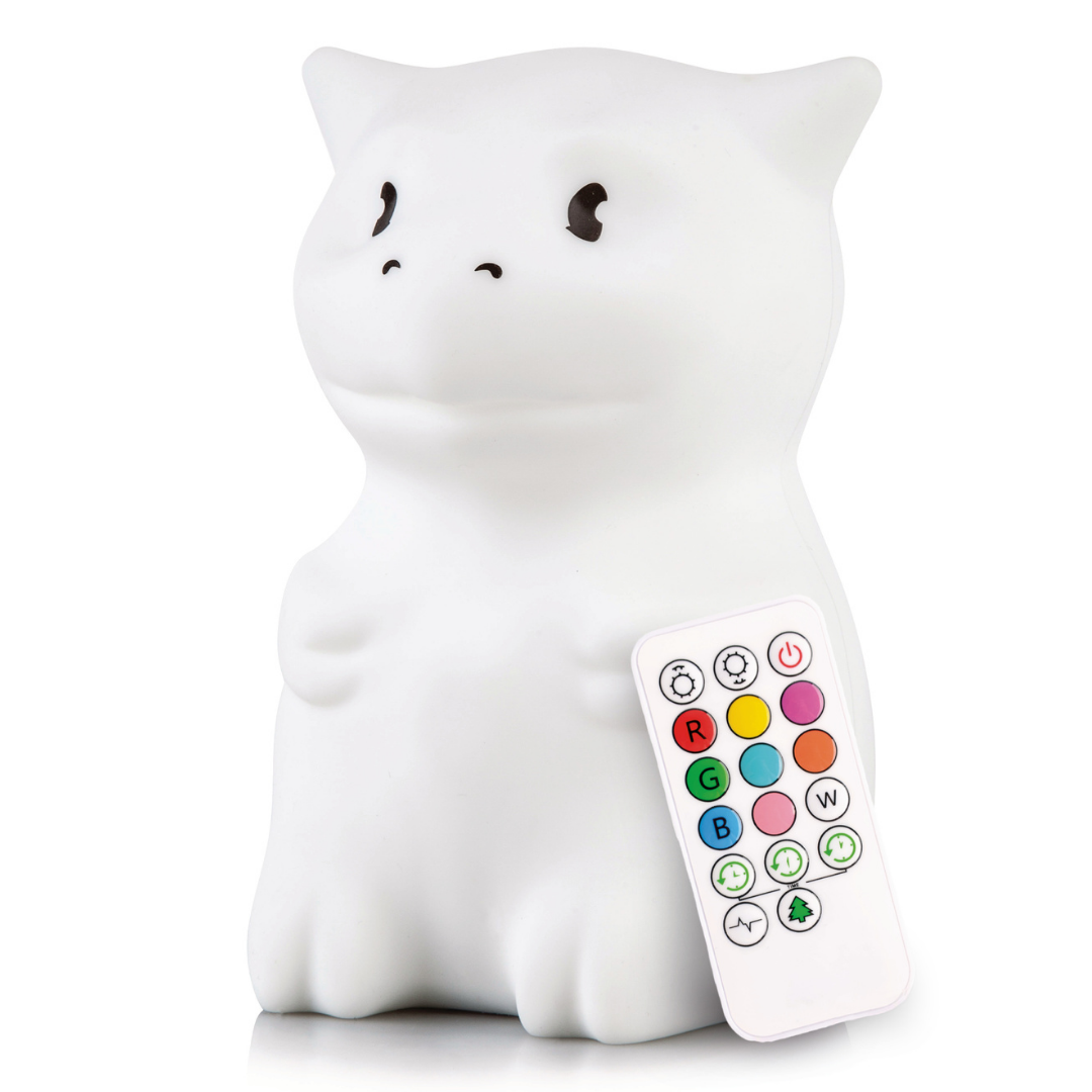 Dragon Silicone Night Light shaped like a white dragon next to a remote control with colorful light-setting buttons, acting as a soothing bedtime toy.