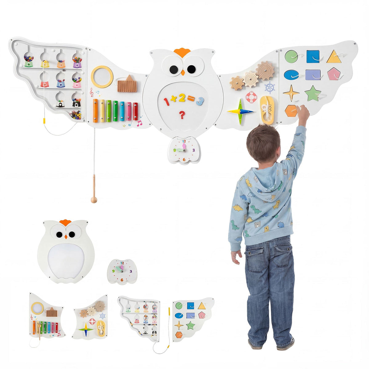 A child interacts with an 11-in-1 Owl Wall Busy Board with Magnetic Math featuring colorful interactive activities including gears, a xylophone, a clock, geometric shape puzzles, and a shoelace tying activity.