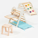 The 4in1 Montessori Climbing Set in Ivory, designed for toddlers (1–3 years), includes a Pikler triangle, arch, slide board, and cushion. This stylish playset is beautifully displayed against a white background.
