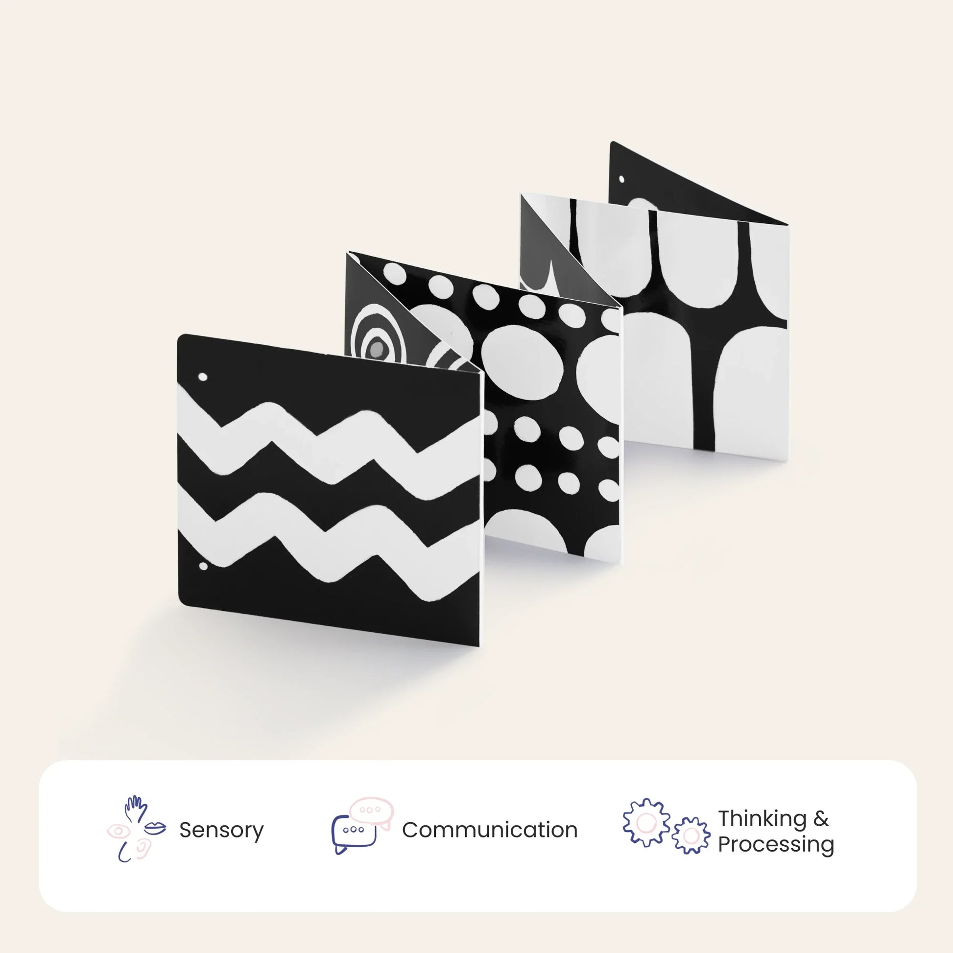 Tiny Land® Montessori Toys for Newborns (0–3 Months): A black-and-white fold-out sensory board with bold zigzag, dot, and geometric patterns to support sensory, communication, and thinking & processing skills—ideal for newborn development.