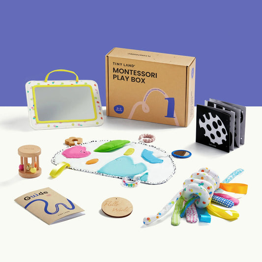 Tiny Land® Montessori Toys for Newborns (0–3 Months) includes a mirror, wooden rattle, cloth book, textured mat, guidebook, wooden token, and colorful sensory toy—ideal tummy time accessories for babies—displayed on white with a purple backdrop.