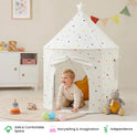 A toddler crawls into a colorful polka-dot Starry Indoor Play Tent for Toddlers.