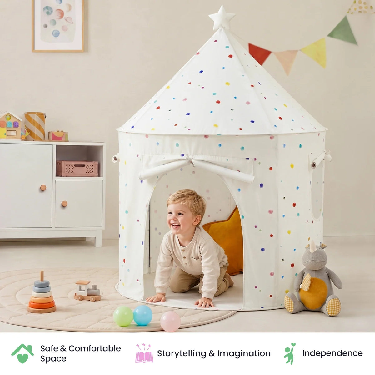 A toddler crawls into a colorful polka-dot Starry Indoor Play Tent for Toddlers.