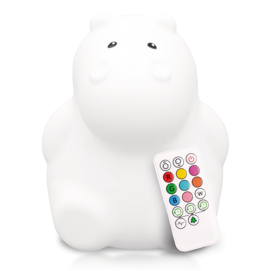 Honey the Hippo Silicone Night Light, a white hippo-shaped soothing sleep aid with a remote control featuring color and setting buttons.