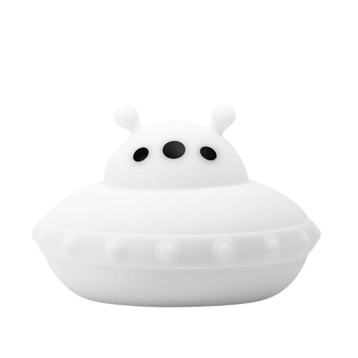 Ugo the UFO Mini Night Light, a white UFO-shaped rechargeable lamp with three black circular eyes and two small antennae on top.