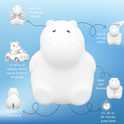 A squishy white Honey the Hippo Silicone Night Light with a sleep timer, tap-to-change colors, color lock, 72-hour battery life, and type-C charging, acting as a soothing light and kids sleep aid.