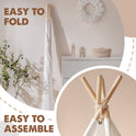 A folded Cozy Kids Teepee Tent with Padded Mat leaning against a wall next to an assembled teepee, with text reading EASY TO FOLD and EASY TO ASSEMBLE.