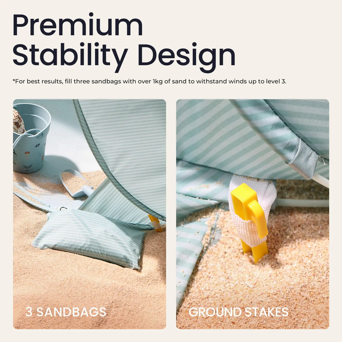 Kids Beach Tent & Sand Toy Set showing sandbags and yellow ground stakes securing the pop-up beach tent in the sand.