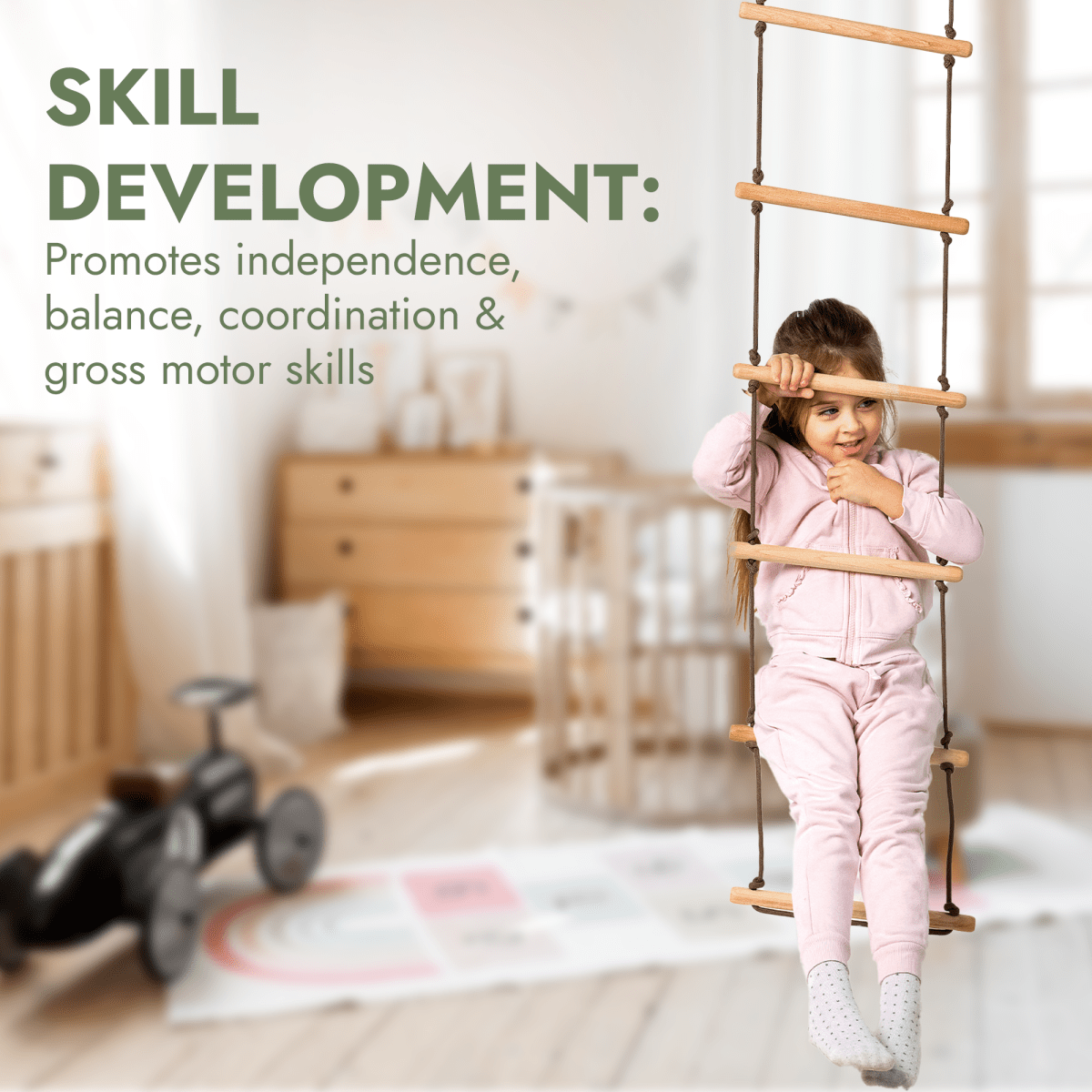 A young girl in a pink outfit climbs the rope ladder from the 3in1 Swing & Climbing Set: Rope Ladder, Gym Rings & Disc Swing in a cozy, sunlit bedroom. Text reads: Skill Development—Promotes independence, balance, coordination & gross motor skills with every climb; perfect for supporting child development at every stage.