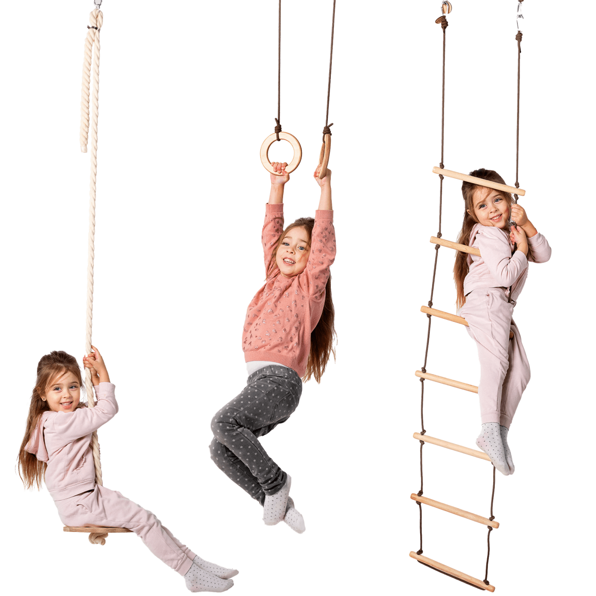 Three young girls enjoy the 3in1 Swing & Climbing Set: Rope Ladder, Gym Rings & Disc Swing—one relaxes on the disc swing, another hangs from the gym rings, and the third climbs up the sturdy rope ladder. This dynamic activity set encourages child development through adventurous play focused on movement and balance. All are dressed in comfortable outfits and smiling brightly against a white background—capturing all the fun and versatility of having an indoor and outdoor swing set right at home.