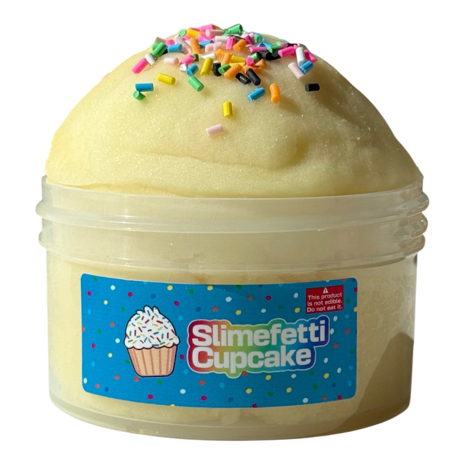Slimefetti Cupcake is a small clear container of yellow, birthday cake-scented slime with rainbow sprinkles. The label shows a cupcake illustration on a confetti background.