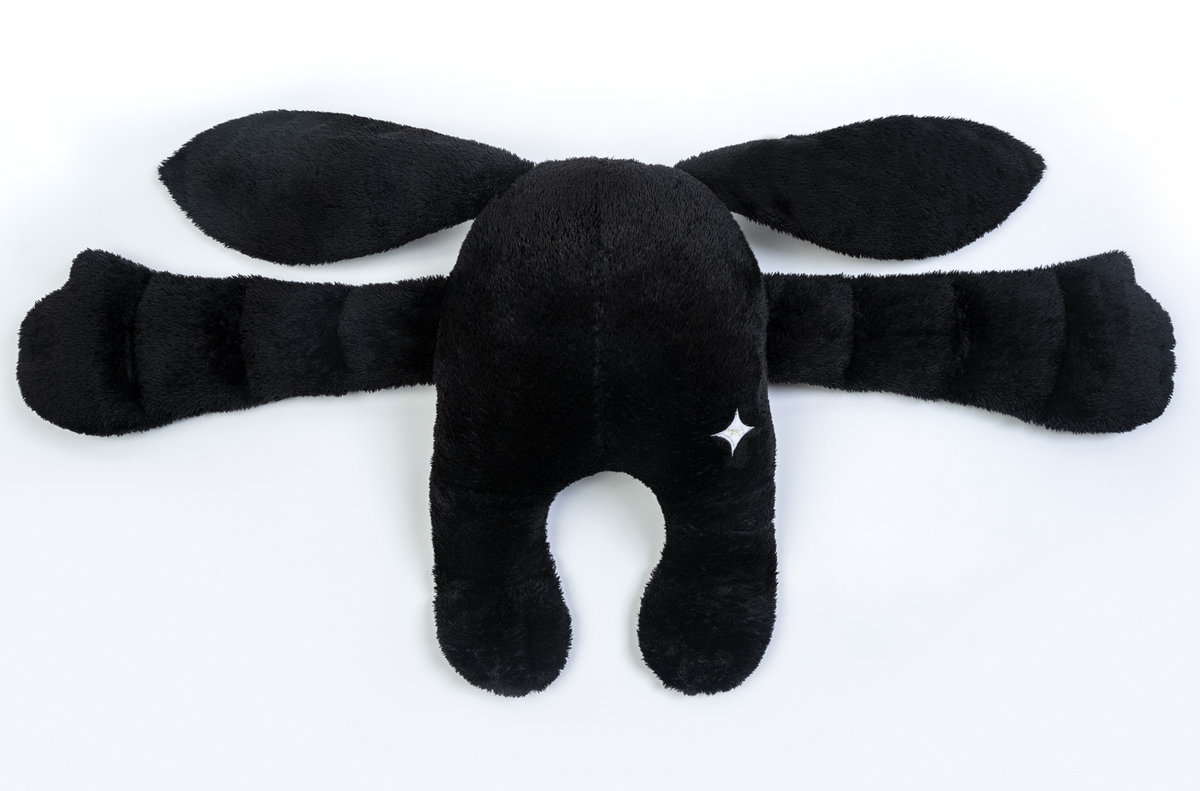 Midnight Moon Pal – Collector’s 5 lb Weighted Plush: a black weighted toy with two long arms, two long ears, and a small white four-pointed star icon on its back.