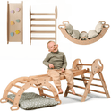 A smiling toddler sits on the beige 4in1 Montessori Climbing Set for ages 1–3, featuring a Pikler triangle, arch, slide board, and cushion—all crafted in light wood with neutral tones.