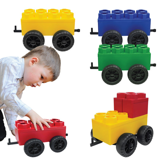 A young boy plays with the Jumbo Building Blocks - 5 Car Kits - Conductor Train Set in red, yellow, blue, and green with wheels, arranged in different positions. These blocks inspire creative STEM learning and imaginative play.