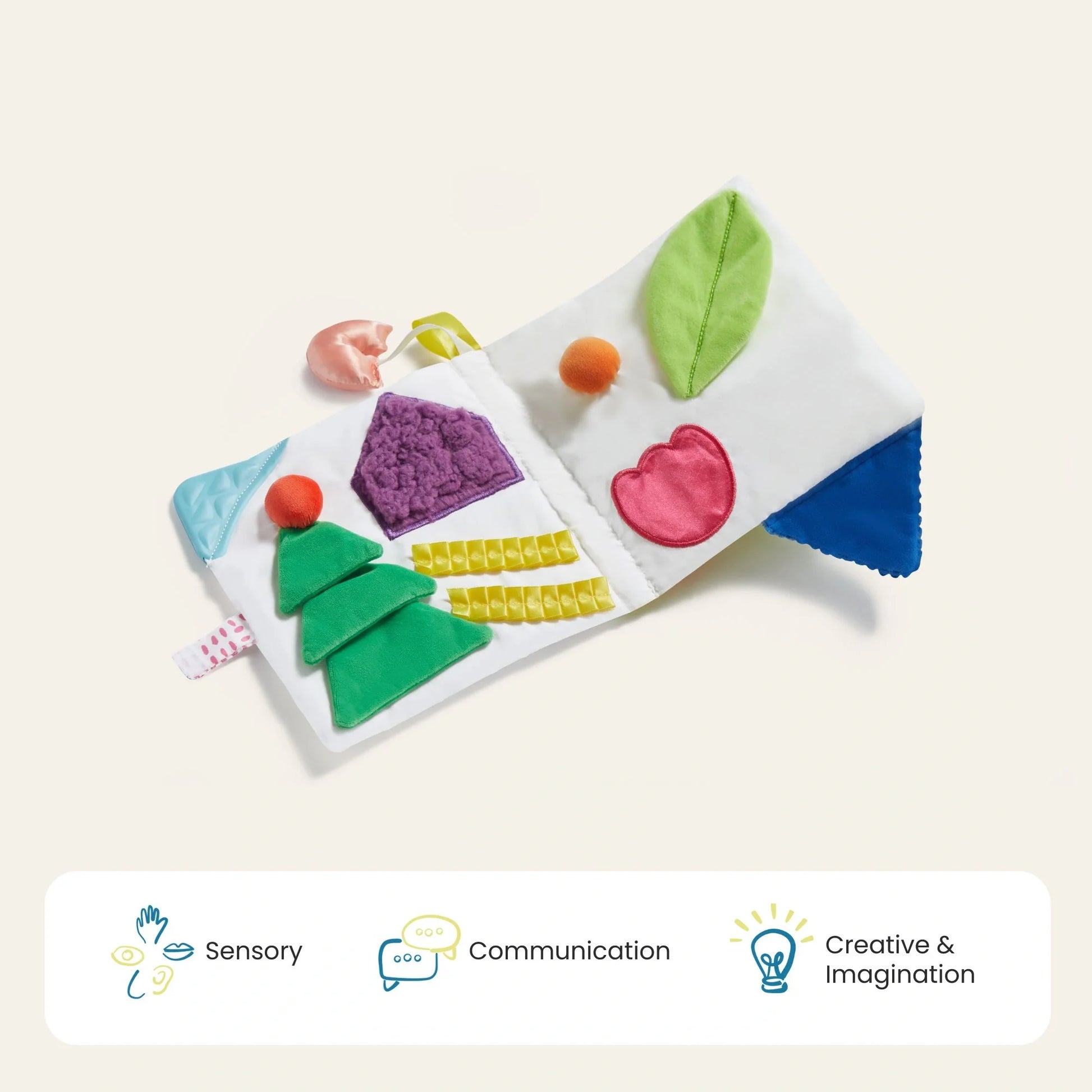 The Tiny Land® Montessori Toys for Newborns (4–6 Months) is a soft, colorful sensory cloth book with textured shapes—tree, leaf, circle, and triangle—designed to boost babies’ communication and fine motor skills.