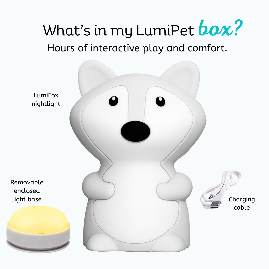 Felix the Fox Mini Night Light, a white fox-shaped rechargeable night light, including a removable round light base and a white charging cable.