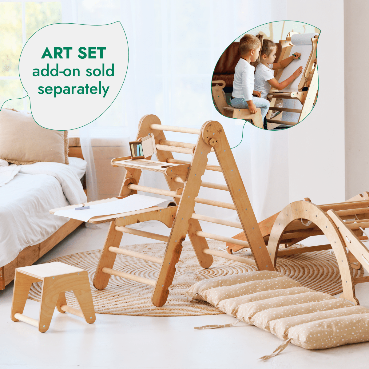 5in1 Montessori Climbing Set featuring a triangle ladder, arch/rocker, slide board/ramp, netting rope, and cushion in a cozy kids’ room. Shown with an attached whiteboard and stool (ART SET add-on sold separately), children are pictured drawing on the whiteboard.