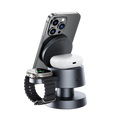 The 4-in-1 Wireless Charging Station features a sleek metallic design and simultaneously charges a smartphone, wireless earbuds in a charging case, and a smartwatch with a black band—ideal for Apple devices, shown on a plain white background.