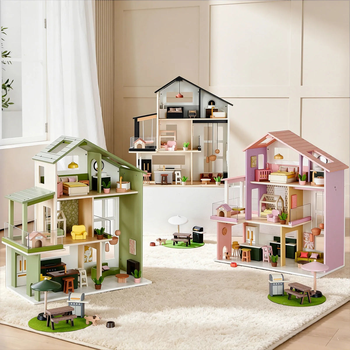 Three multi-story 1:12 scale Sweetwood Cottage Dollhouse (48-pc Furniture) wooden dollhouses with various furniture sets and small outdoor patio accessories arranged on a rug.