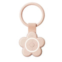 The Portable Newborn Baby Sleeping Gadgets White Noise Device in pink is a flower-shaped sleep machine with a large top ring and central buttons for power and volume—ideal for soothing babies and adults anywhere.