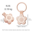 The Portable Newborn Baby Sleeping Gadgets White Noise Device is a pink, flower-shaped sleep machine (88mm x 88mm x 33mm, 0.19kg) with three front buttons for soothing sounds and a circular ring; manual measurement errors may occur. Shown from two angles.