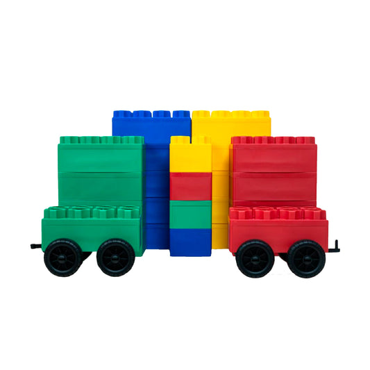 The Jumbo Building Blocks 24 PC with 2 Wheel Kits - Big City Set features large, colorful interlocking blocks in green, red, blue, and yellow arranged as toy train cars on a white background.
