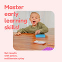 A young boy with an excited expression sits at a table using blue silicone sensory toys and word cards from the First Words Game Bundle for preschool reading games, featuring the text Master early learning skills! and Get results with active, multisensory play.