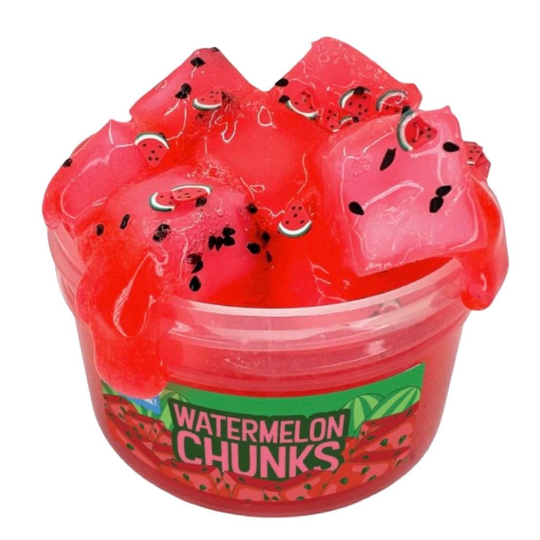 A clear 7 oz container holds Watermelon Chunks Jelly Cube Slime with fake black seeds and mini watermelon slice accents, scented like Watermelon Jolly Rancher for a fun sensory experience.
