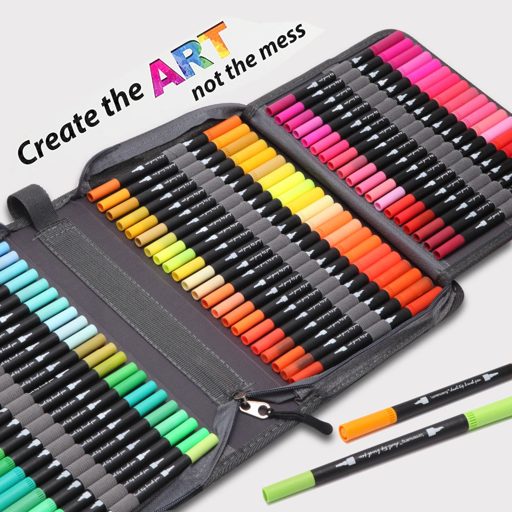 A vibrant set of dual tip brush pens is arranged in a gray zippered case, organized by shades from blues to oranges. It invites creativity with the text Create the ART not the mess. Two markers, one orange and one green, lie on the side. .