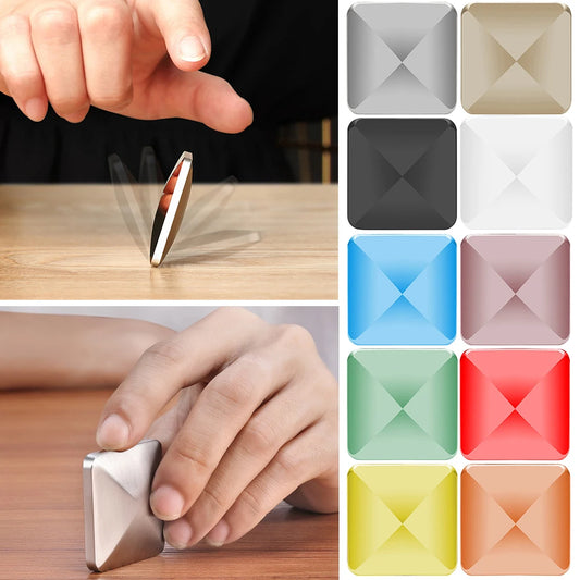 A person spins a Plastic Desk Toy Kinetic Skill Desktop Flip Rotating Pocket Fidget Spinner, made in Mainland China, on a table; next to it, a 3x3 grid displays the toy in nine colors: silver, gold, gray, white, light blue, pink, dark blue, red, and green.