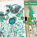A page of intricate green and blue floral doodles with abstract patterns lies beside a Vibrant Dual Tip Brush Pen Marker Set. Nearby, three dual-tip pens in various shades of green are labeled Green Department and Fantasy Green.