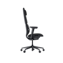 Side view of the Hexcal Inspire Chair, a sleek black ergonomic chair featuring adjustable armrests, headrest, and a five-wheel base, shown against a plain white background.