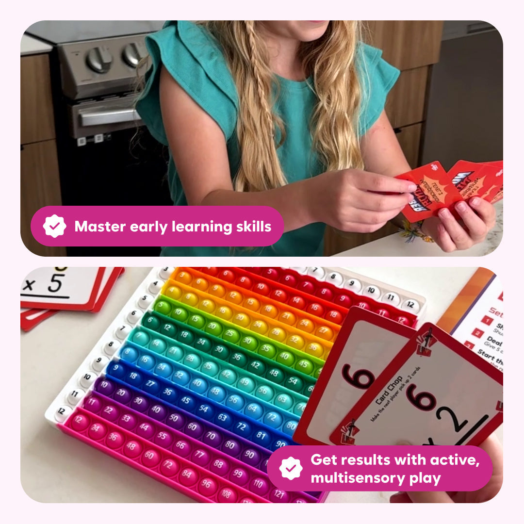 A child holds math playing cards over a rainbow-colored silicone board for the Number Ninja Multiplication & Division Game used to practice math facts.