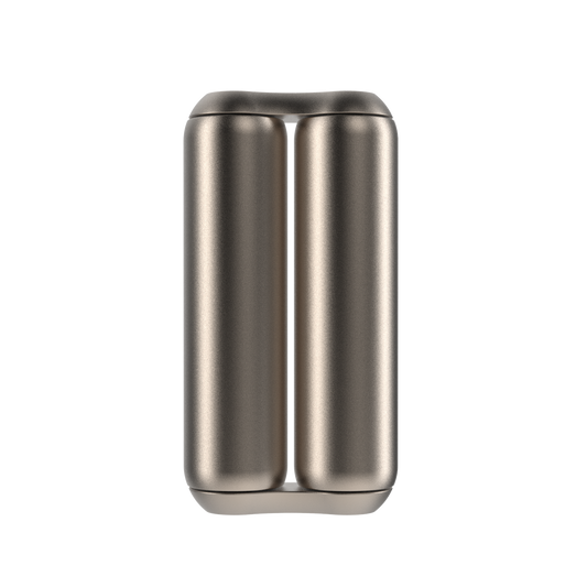 A sleek, metallic cylindrical object with two parallel columns joined side by side—the ONO Roller Titanium—ideal as desk decor or a premium fidget accessory, set against a white background.