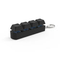 The 4Keys Finger Button Anti Stress Keychain features four black mechanical keyboard keycaps on a rectangular base with a metal keyring—ideal for office decompression and calming stress relief on the go. Suitable for kids and adults.