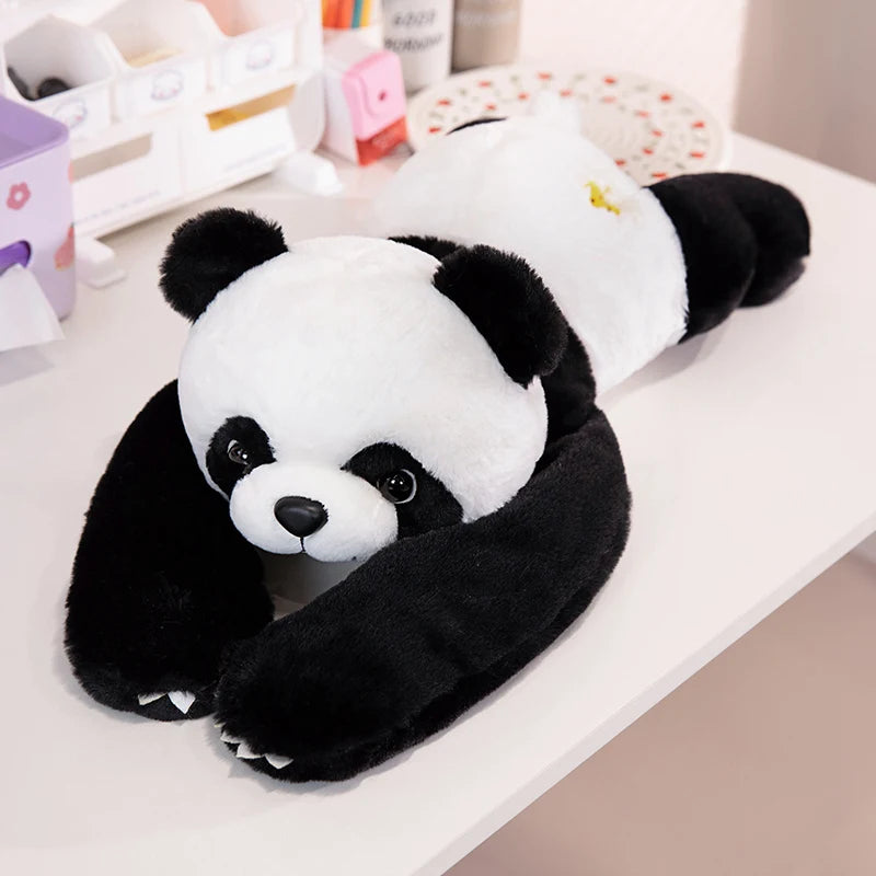 A Long Arm Animal Weighted Stuffed Animal Soft Lazy Fluffy Plush Panda lies on a white desk surrounded by stationery and a round plate in the background.