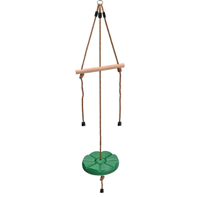 The Disc Swing Gym Monkey Bars Tree Swing Set For Indoor And Outdoor Fun features a green flower-shaped seat, sturdy brown ropes, and a wooden handlebar—ideal as a tree swing or for climbing with monkey bars for added backyard excitement.