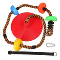 The Kids Tree Swing Chair Outdoor Disc Swing features a red seat, brown rope, multicolored footholds, black strap, and metal carabiner—a durable hanging seat for garden or backyard fun for children of all sizes.