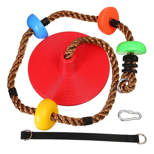 The Kids Tree Swing Chair Outdoor Disc Swing features a red seat, brown rope, multicolored footholds, black strap, and metal carabiner—a durable hanging seat for garden or backyard fun for children of all sizes.