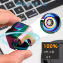 A hand holds the Infinity Gear Cube Spinner, a multicolor antistress toy made in Mainland China near a laptop. Korean text highlights features like 100% stainless steel and 360° rotation.